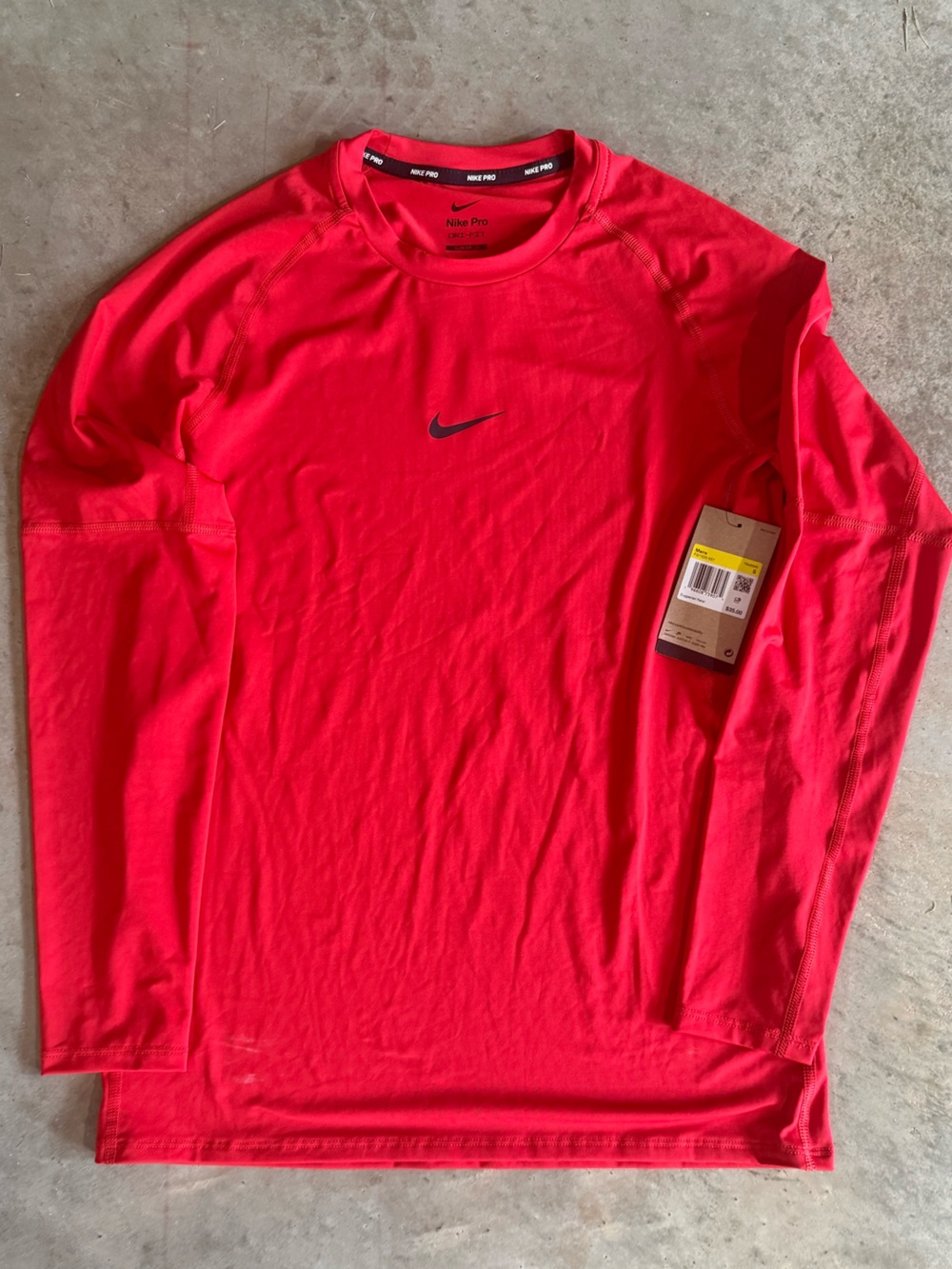 Nike Men's Red Long Sleeve Dri-FIT Shirt with Black Swoosh